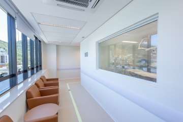 Hospital corridor and seating area inside Baía Sul Mulher, Florianópolis