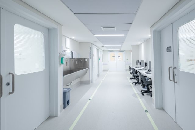 Hospital corridor and seating area inside Baía Sul Mulher, Florianópolis